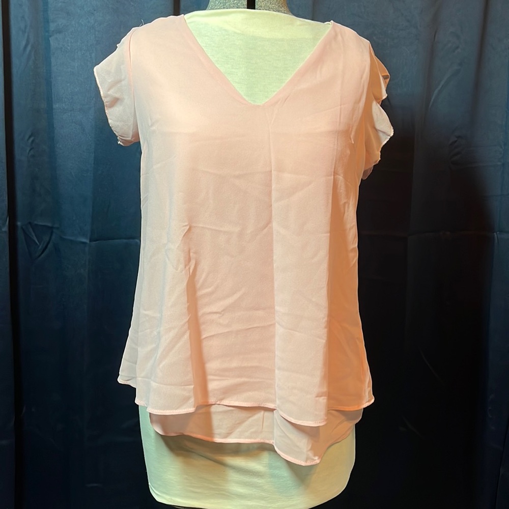 Pink chiffon-like top